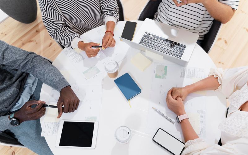 Team Working From Above Web