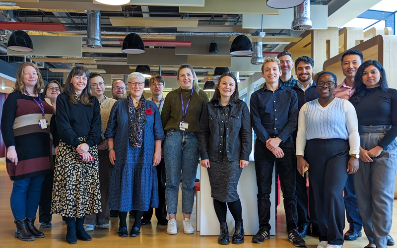 Photo of the Appian and RDS teams, standing and smiling at the camera