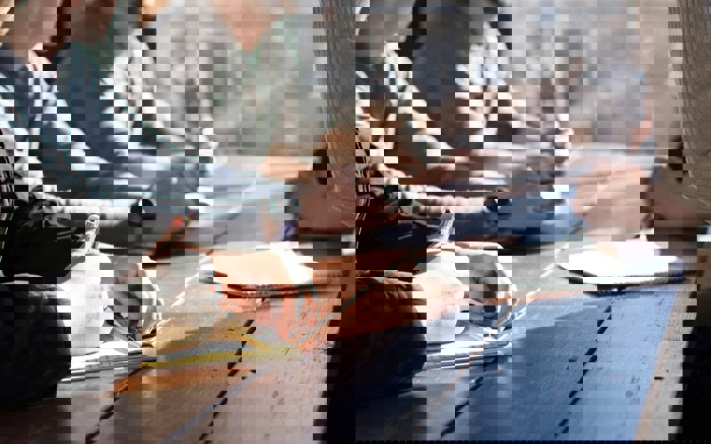 A group of people sitting around a table